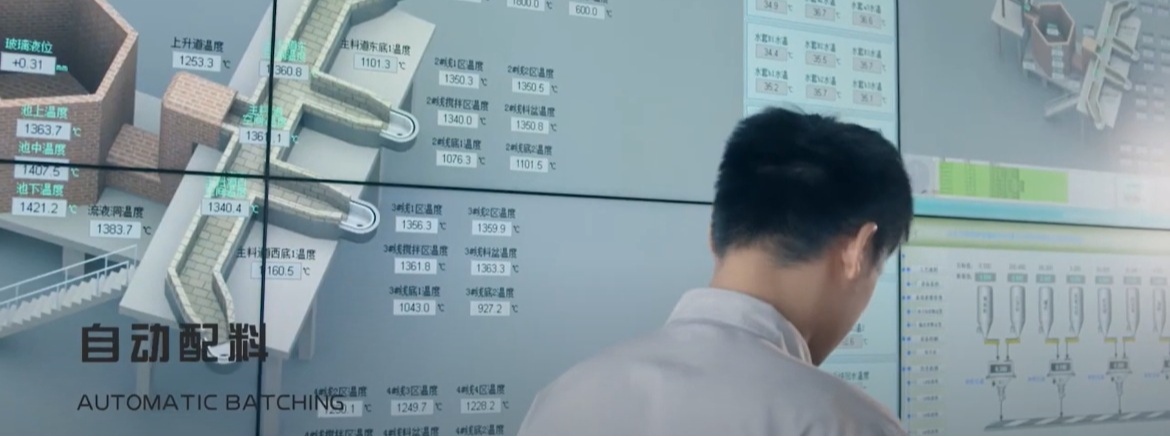 Operator at Feemio's automatic glass batching control system